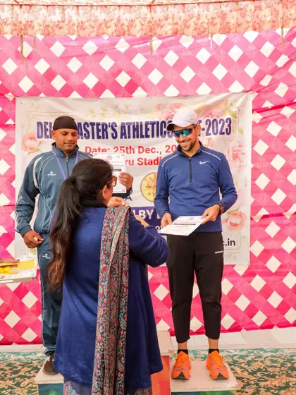 Receiving the medal and certificate. These are the tangible rewards for the countless hours of invisible work put in during training.