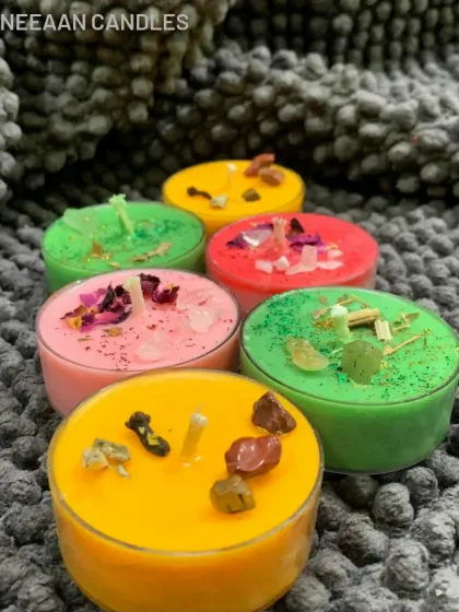 These tiny tealights are perfect for creating cozy corners. I've made them in bright, happy colors and topped them with different crystals to bring a little glow and good energy.