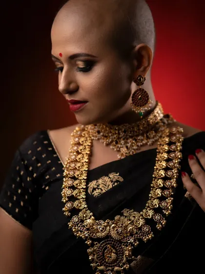 A softer profile from the same series, this image highlights the intricate temple jewellery against the model's skin. The makeup is understated to let the unique wardrobe and the model's expression shine, showing my ability to adapt to any creative brief.