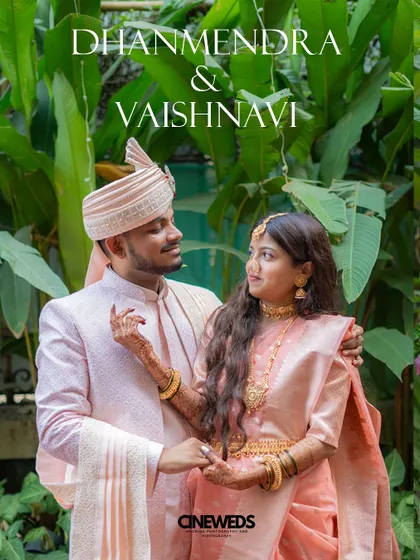 An elegant portrait of the couple, Dhanmendra and Vaishnavi, on their Haldi day, dressed in beautiful coordinated pastel pink outfits.