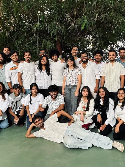 A final farewell photo with the team and interns.