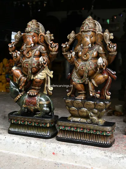 A full view of the pair of 41 and 42-inch dancing Ganesha statues, perfect as a powerful duo for a large space.