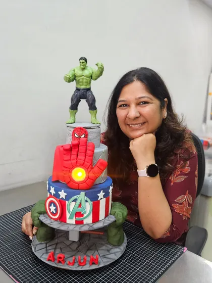 A happy moment with the powerful Avengers anti-gravity cake.