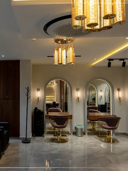 The interior of our Srinagar salon combines modern luxury with comfort, featuring plush chairs and perfect lighting for your makeup and beauty services.