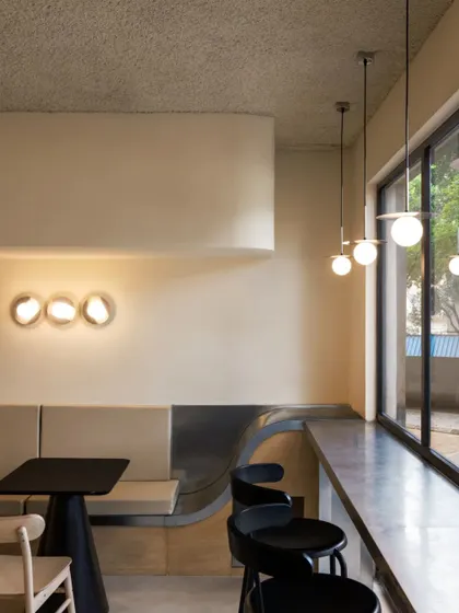 The window-side counter seating, a perfect spot for people-watching or catching up on work.