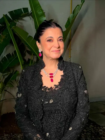 For this mother of the bride, we went with a classic, elegant look. Her skin is flawless, and her eyes are defined to match her sophisticated black lace outfit.
