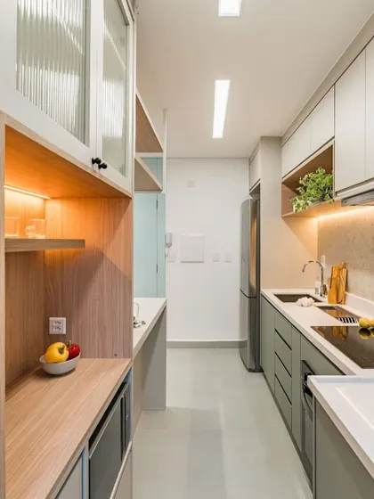 This render shows a tall crockery unit with glass doors and internal lighting, combined with a microwave niche. It's a perfect blend of functional storage and elegant display.