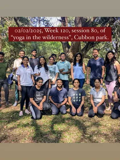 A happy group photo after our "Yoga in the Wilderness" session. The smiles and sense of community are what make these Sunday mornings so rewarding.