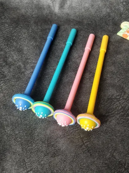 Planet-topped pens for the space enthusiast. These colorful pens are part of my quirky stationery collection and are perfect for school or office.