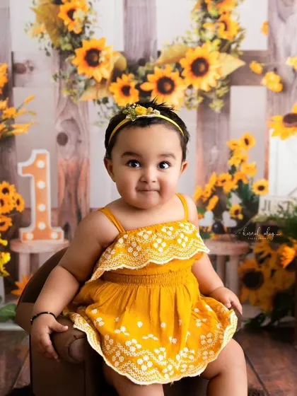 A cute, curious expression that perfectly captures the personality of this one-year-old.