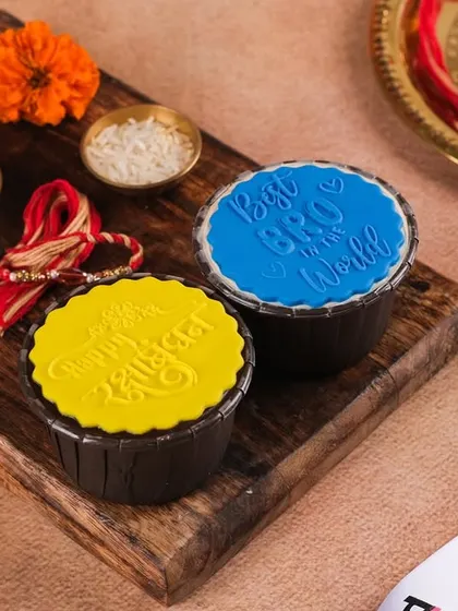 Another look at our Rakhi special cupcakes, with "Happy Rakhi" and "Best Bro in the World" messages. They are the perfect treat to celebrate the sibling bond.
