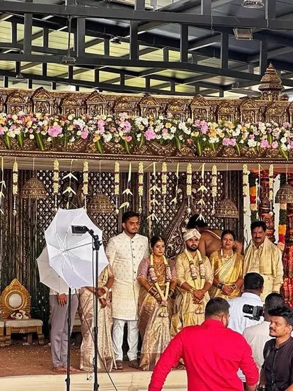 A behind-the-scenes look at a wedding ceremony, showcasing the scale and grandeur of the traditional mandap we constructed.