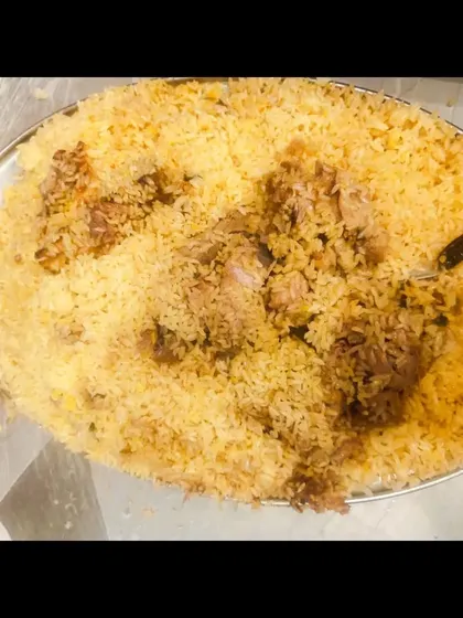 A perfect plate of mutton biryani, ready to be enjoyed. This is a popular choice for all events.