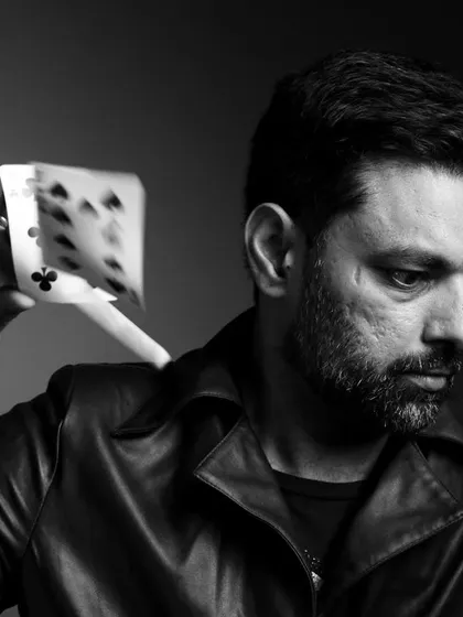 A black and white portrait from a fun, impromptu photoshoot. It captures the serious, artistic side of my magic.