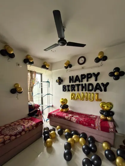 The black and gold theme provides a stylish and celebratory look for an adult's birthday.