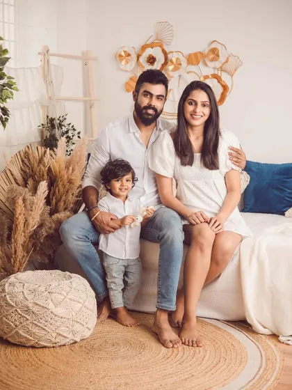 Sometimes clients become family. We love capturing candid, playful moments like this in our cozy, lifestyle studio setup.