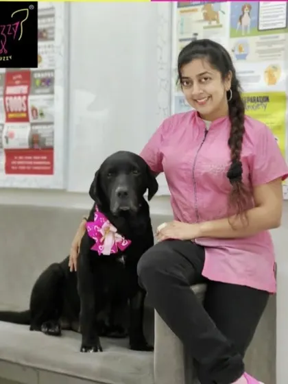 Aretha, the black beauty. This lovely black Labrador's coat is gleaming after her spa session, showing how healthy and shiny a well-cared-for coat can be.