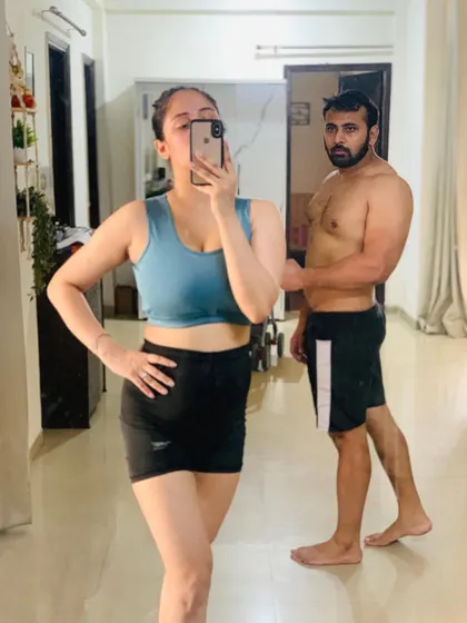 A workout selfie with my husband. We believe in being a fit couple and supporting each other's health goals.