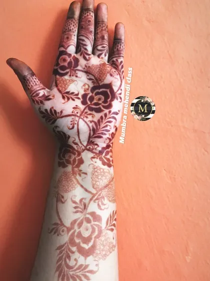 Stain goals! This is the beautiful result of a floral design after the henna has fully developed.