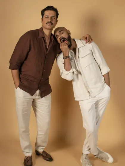 Even in a professional shoot, there is always room for spontaneity. This candid moment with Raghu Ram and Sumeet Vyas shows a lighter, more playful side to their personalities, adding authenticity to the campaign.
