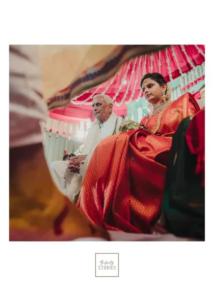 A portrait of the bride during the ceremony, viewed from the groom's perspective, creating an intimate feel.