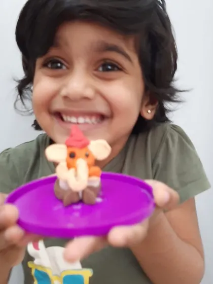 Look at the pride and joy in their creations! For Ganesh Chaturthi, children used various materials like clay, leaves, and paper to create their own Ganesha figures. This is a wonderful fusion of art, culture, and personal expression.
