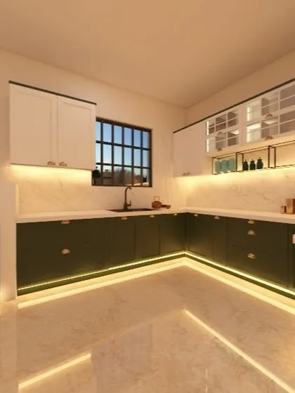 This U-shaped kitchen layout maximizes counter space and storage. The design features a bold contrast between dark green lower cabinets and white upper cabinets, with warm lighting creating an inviting atmosphere.