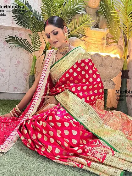 A festive Karwa Chauth look, with the hair styled elegantly in a traditional Banarasi saree.