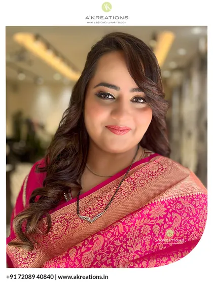 A radiant final look. We focused on creating a soft, glowing makeup style and a timeless hairstyle to match the elegance of this beautiful pink Banarasi saree.