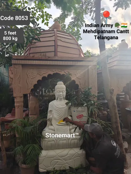 The sun's rays embrace the 5-foot Buddha statue destined for the Indian Army in Hyderabad, making it look completely divine.
