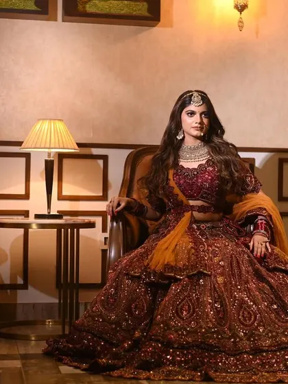 A confident and powerful bridal portrait. The bride's direct gaze and poised posture give this shot its main character energy.