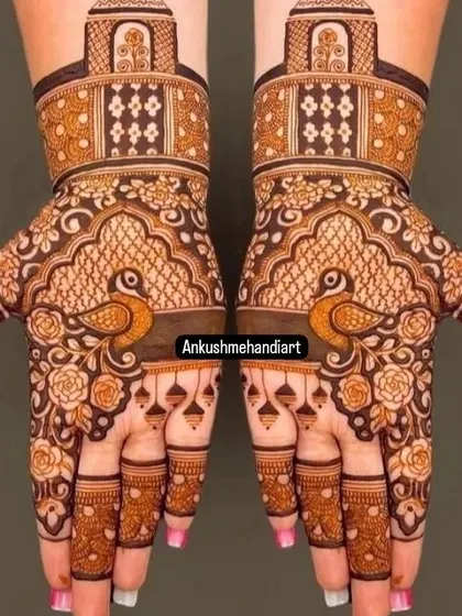 A lovely design with symmetrical peacocks surrounded by rose patterns, perfect for a guest or for a simpler bridal look.