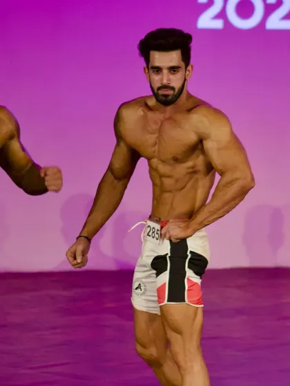 Competing in the lineup. Standing out in a group of great physiques requires superior conditioning and posing.