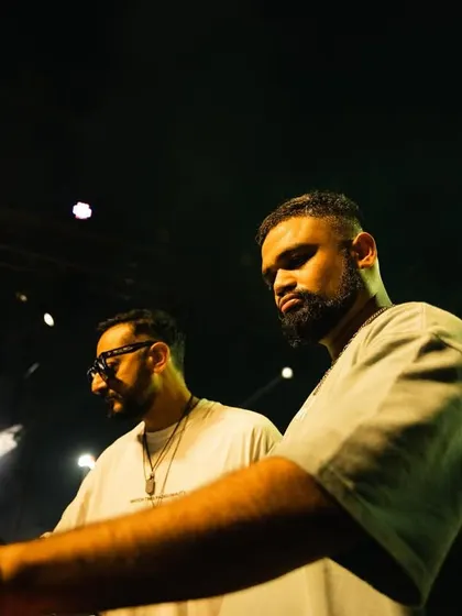 A close-up shot of me and Nikhil Chinapa during the Innellea afterparty, showing our focus and chemistry.