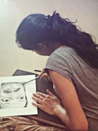 Here you can see the careful process of creating a hyper-realistic pencil sketch. I work meticulously from a reference photo to ensure every detail contributes to the final likeness, capturing the subject's unique features with precision.
