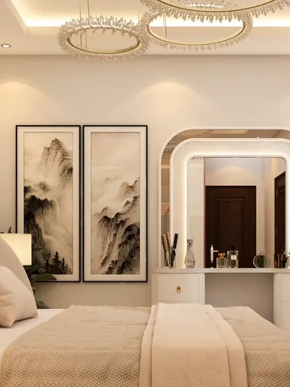 A serene master bedroom where the dressing table is seamlessly integrated into the room's design. The backlit arched mirror complements the soft, neutral color palette and elegant crystal chandeliers.