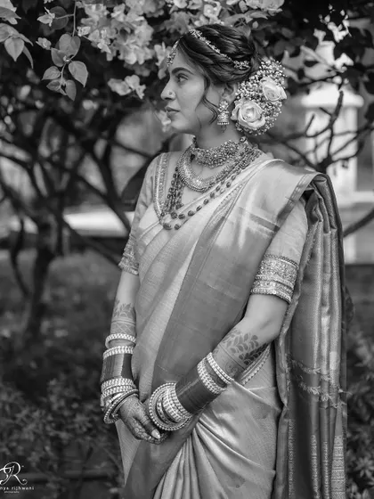 The same beautiful portrait in black and white, giving it a timeless and classic feel.