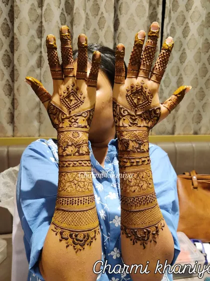 A beautiful and intricate design for the groom's sister. It's detailed enough to feel special but allows her to be comfortable and enjoy the festivities.