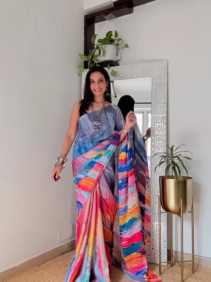I love the riot of colors in this abstract printed crepe saree. It's like wearing a piece of art. Perfect for someone with a bold and artistic sense of style.