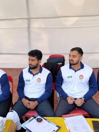 Our team of umpires and technical officials sitting at the officials' table. Their knowledge and dedication are crucial to the success of any tournament.