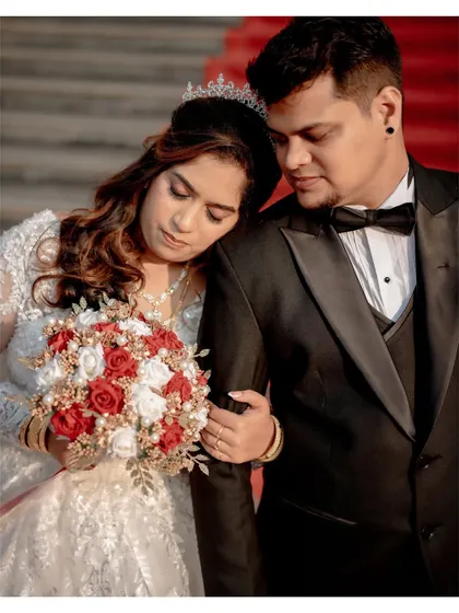 A tender moment between the bride and groom after saying "I do." This photo captures the love and emotion of a couple who have been together for a decade, finally sealing their bond.