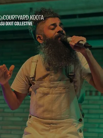 Vasu Dixit engaging the crowd during his high-energy performance. Our space allows for a strong connection between the artist and the audience, making every concert a shared experience.