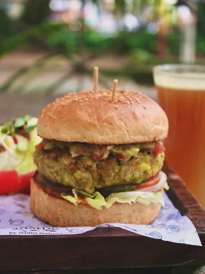 Our Vegetable Tikki Burger just got a whole lot more delicious. It features our signature in-house burger buns, a flavorful quinoa tikki, creamy avocado, and vegan burrata cheese.