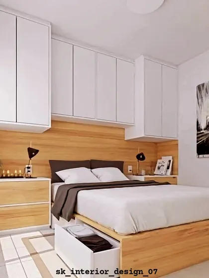 This design showcases smart storage solutions for a compact bedroom. It includes overhead cabinets and a bed with a large pull-out storage drawer.
