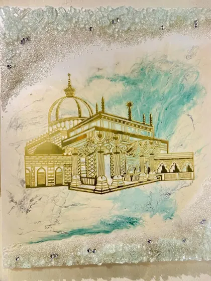 A view of the Ajmer Sharif Dargah artwork on an easel, giving a sense of its size and artistic presence.