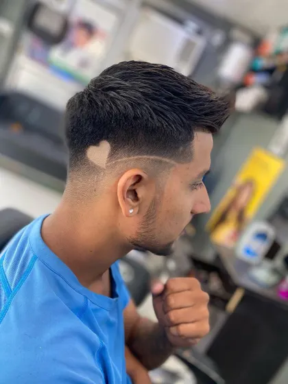 This image shows the initial shaved heart design before the color was applied. Even without color, the hair tattoo is sharp and clean.