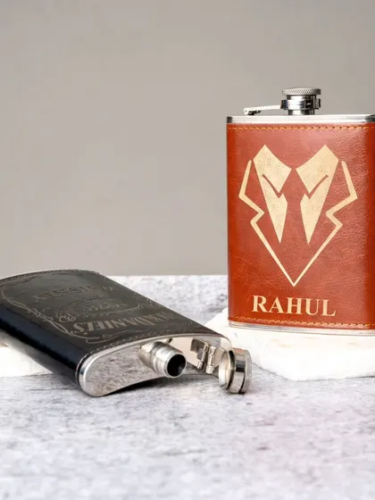 My faux leather hip flasks are a classic gift for men. They can be engraved with a name and a design, like the suit graphic shown here, and are available in brown and black.