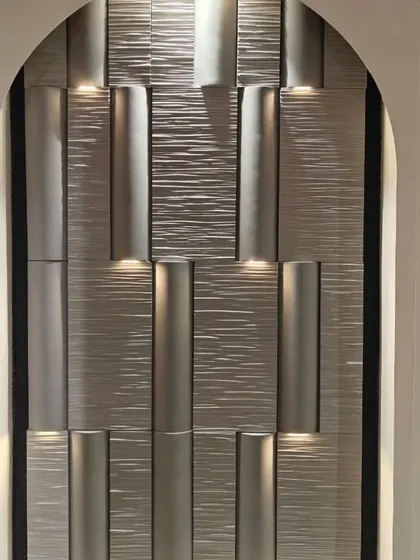 Another view of our wall cladding with concealed lighting, showing a different texture. This demonstrates the versatility of the system for creating unique architectural details.