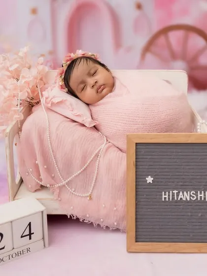 Announcing baby Hitanshi's arrival! I can incorporate personalized details like a letter board and date blocks into your newborn's themed session.