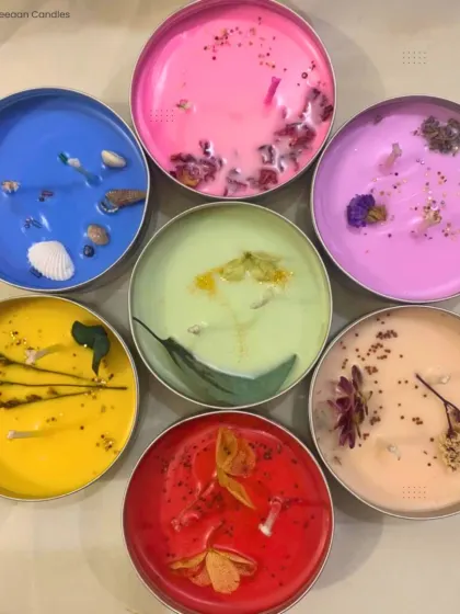 Let your space speak in colors and scents. This set of 7 Chakra tin candles is hand-poured and topped with natural botanicals to brighten your day and balance your energy.